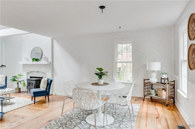 5905 Willow Creek Way, Richmond, VA 23225 - dining space featuring hardwood / wood-style flooring and a brick fireplace