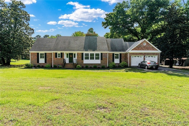 12387 Hanover Courthouse Rd, Hanover, VA 23069 - view of front of home featuring a garage, a front lawn, asphalt driveway, and brick siding