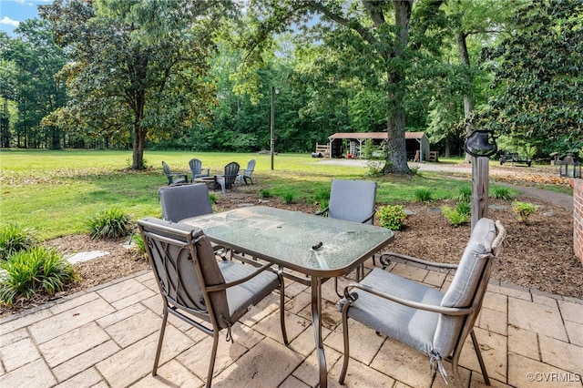 12387 Hanover Courthouse Rd, Hanover, VA 23069 - view of patio with outdoor dining area and view of wooded area