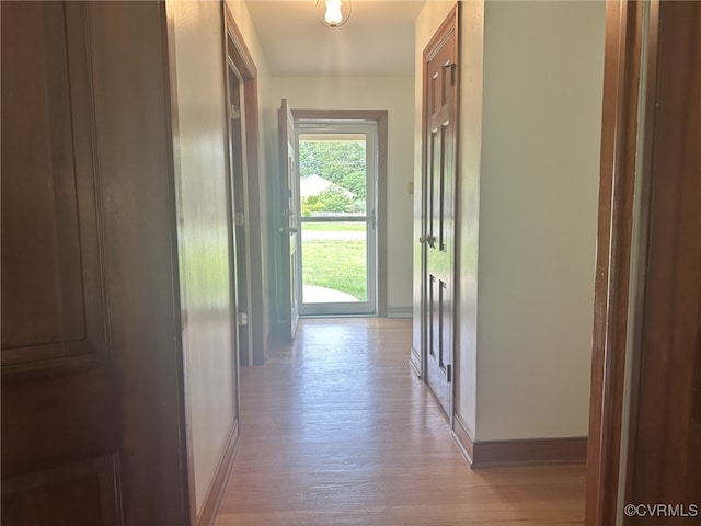 9079 Cudlipp Ave, Mechanicsville, VA 23116 - corridor with baseboards and light wood-style flooring