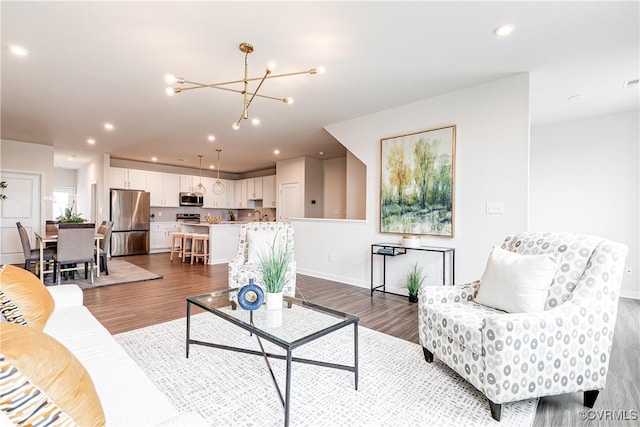 1900 Roseneath Rd Unit 9A, Richmond, VA 23230 - living room featuring dark wood finished floors, a chandelier, baseboards, and recessed lighting