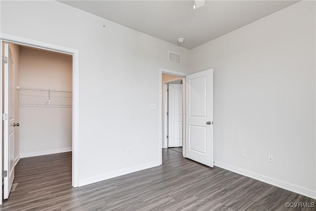 1900 Roseneath Rd Unit 9A, Richmond, VA 23230 - unfurnished bedroom featuring wood finished floors, a closet, and baseboards