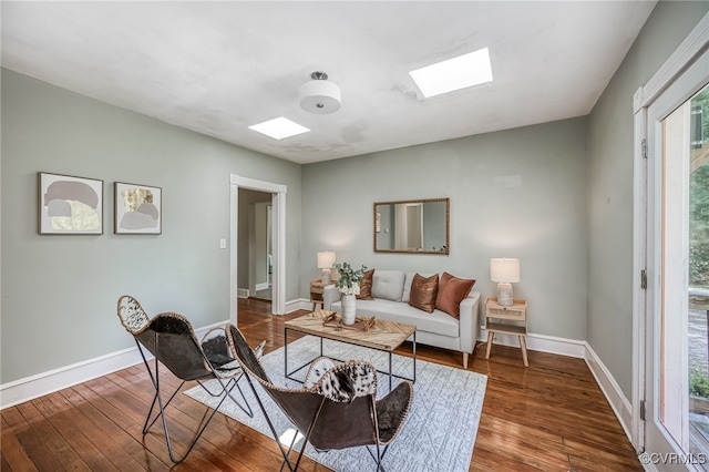 524 Highland Ave, Colonial Heights, VA 23834 - living area featuring a skylight, hardwood / wood-style floors, and baseboards