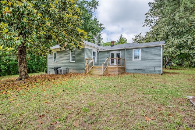 524 Highland Ave, Colonial Heights, VA 23834 - rear view of house with a wooden deck, a lawn, french doors, and central air condition unit