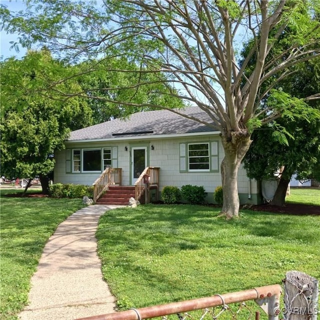 4846 Stanley Dr, Chesterfield, VA 23234 - ranch-style house with roof with shingles and a front lawn