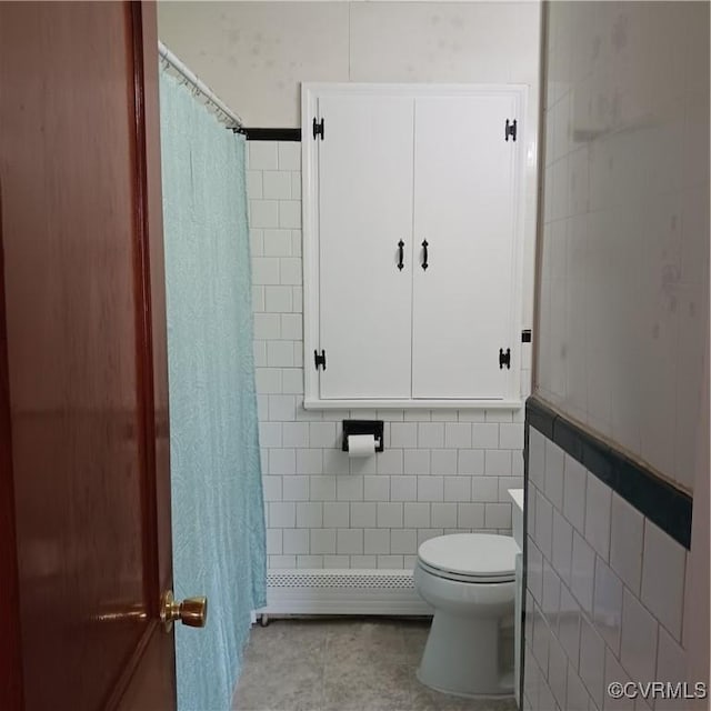 4846 Stanley Dr, Chesterfield, VA 23234 - full bathroom with tile walls, baseboard heating, tile patterned flooring, and a shower with curtain