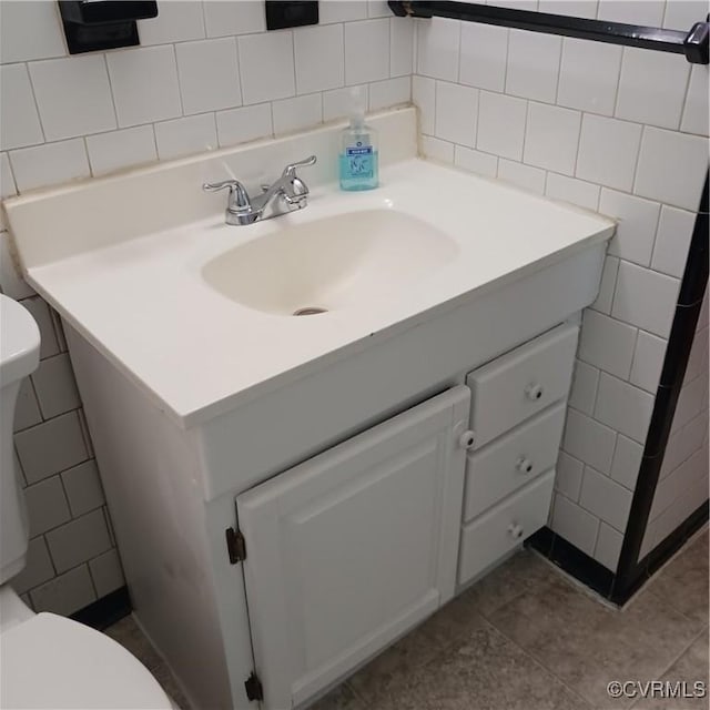4846 Stanley Dr, Chesterfield, VA 23234 - half bathroom with tile walls, vanity, and tile patterned floors