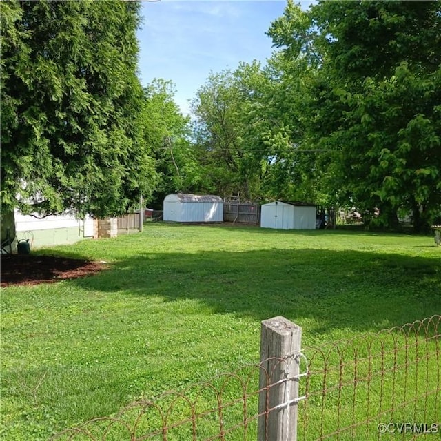 4846 Stanley Dr, Chesterfield, VA 23234 - view of grassy yard with a storage shed