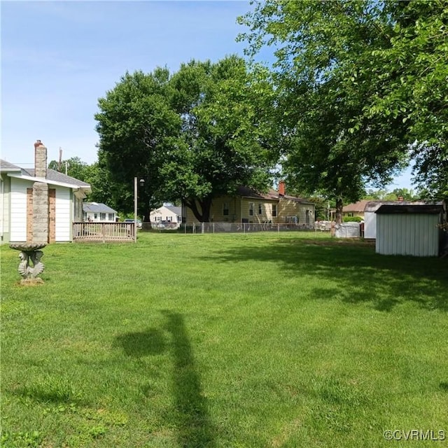 4846 Stanley Dr, Chesterfield, VA 23234 - view of green lawn with a shed