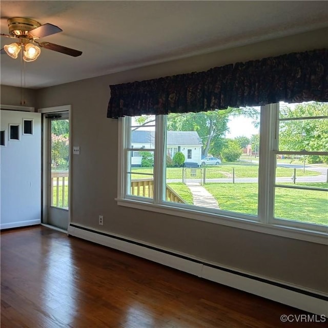 4846 Stanley Dr, Chesterfield, VA 23234 - empty room with baseboard heating, a ceiling fan, and dark wood finished floors
