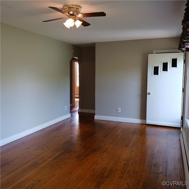 4846 Stanley Dr, Chesterfield, VA 23234 - empty room with arched walkways, a ceiling fan, dark wood-type flooring, and a baseboard radiator