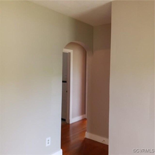 4846 Stanley Dr, Chesterfield, VA 23234 - spare room with arched walkways and dark wood-style flooring