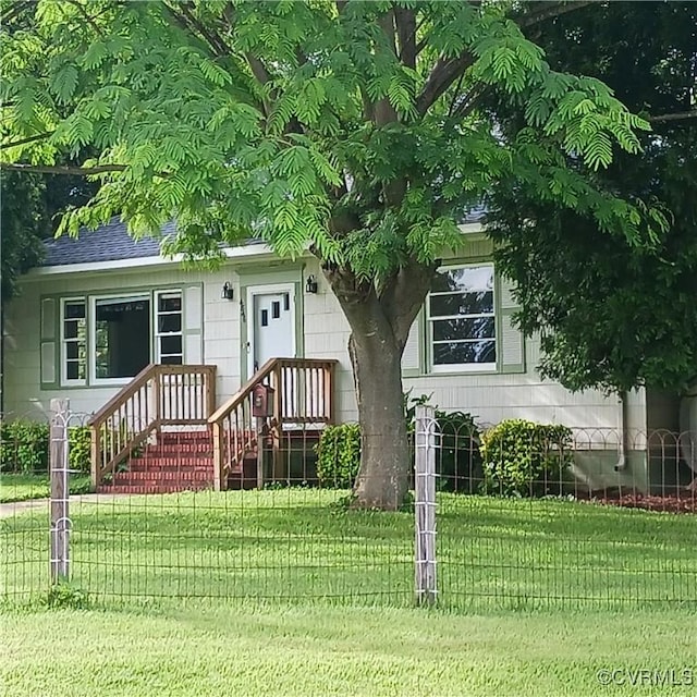4846 Stanley Dr, Chesterfield, VA 23234 - view of front of house featuring a front yard and a shingled roof