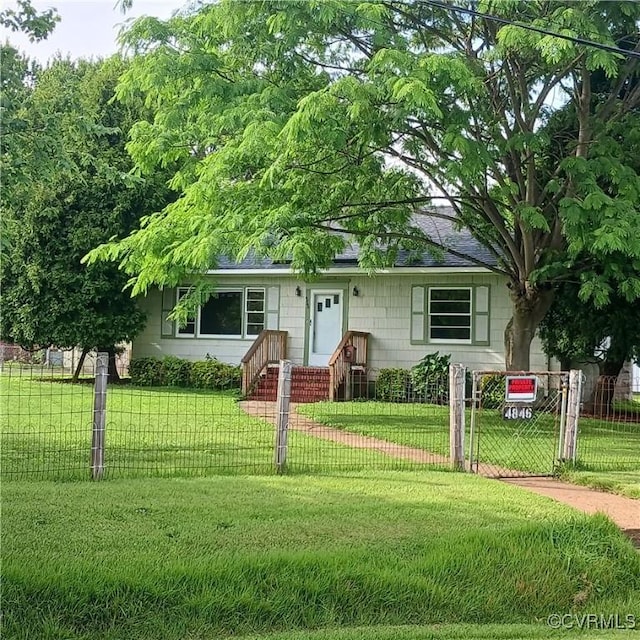 4846 Stanley Dr, Chesterfield, VA 23234 - view of front of property featuring a fenced front yard and roof with shingles