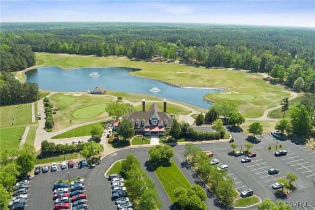 5681 Saint Leger Dr, Providence Forge, VA 23140 - bird's eye view of a heavily wooded area, a golf course, and a nearby body of water