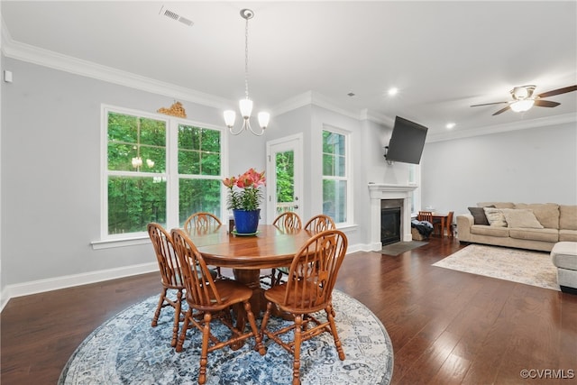 5681 Saint Leger Dr, Providence Forge, VA 23140 - dining room featuring dark wood finished floors, a fireplace with flush hearth, baseboards, ornamental molding, and ceiling fan