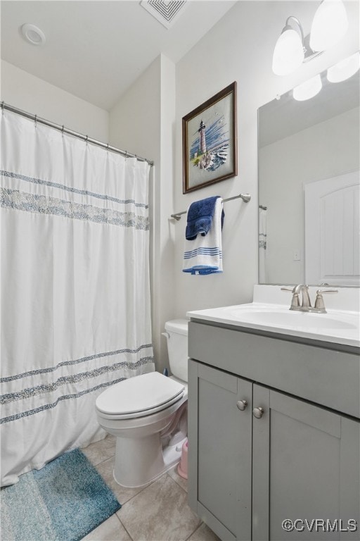 5681 Saint Leger Dr, Providence Forge, VA 23140 - bathroom with vanity, toilet, tile patterned floors, and curtained shower