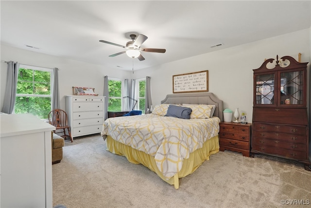 5681 Saint Leger Dr, Providence Forge, VA 23140 - bedroom with light carpet, multiple windows, and a ceiling fan