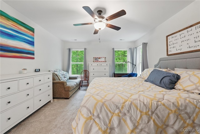 5681 Saint Leger Dr, Providence Forge, VA 23140 - bedroom with light colored carpet and ceiling fan