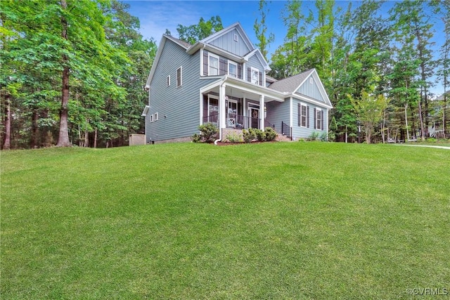 5681 Saint Leger Dr, Providence Forge, VA 23140 - craftsman house with covered porch, board and batten siding, and a front lawn