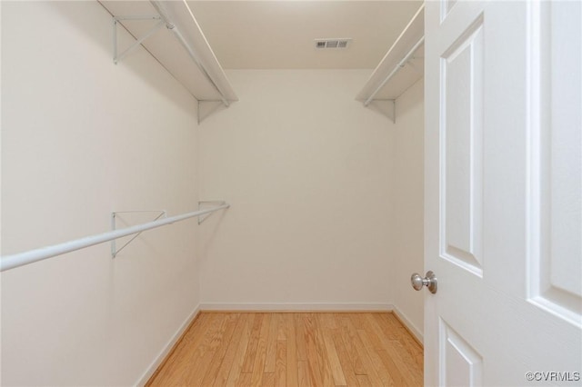 spacious closet with light wood-type flooring