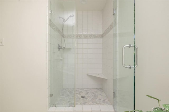 full bathroom with a shower stall