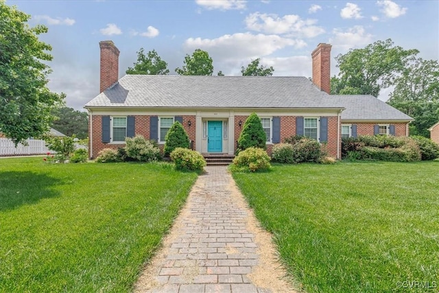104 Peter Francisco Dr, Hopewell, VA 23860 - view of front of property with a front lawn, brick siding, and a chimney