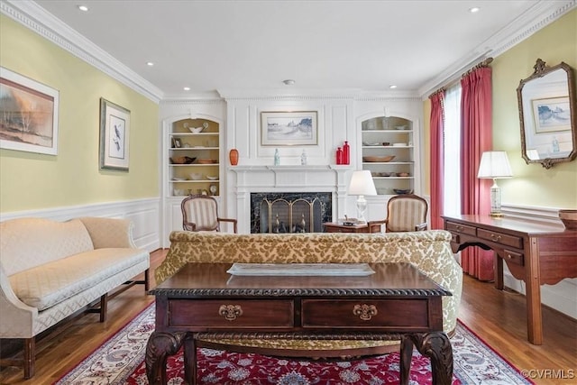 104 Peter Francisco Dr, Hopewell, VA 23860 - sitting room featuring built in features, crown molding, wood finished floors, a premium fireplace, and recessed lighting