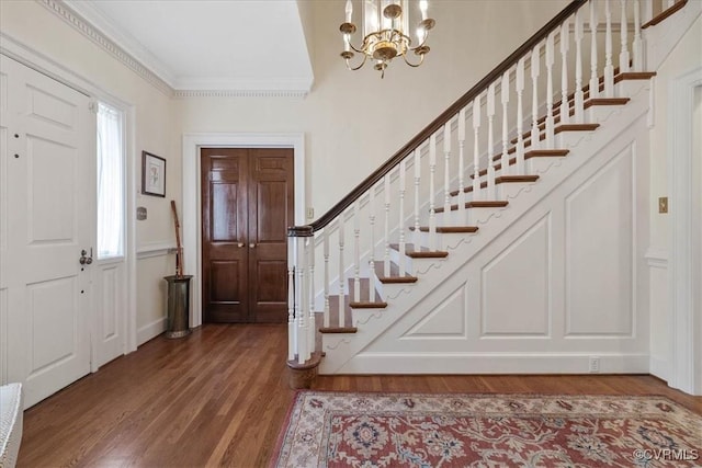 104 Peter Francisco Dr, Hopewell, VA 23860 - entryway featuring wood finished floors, stairway, ornamental molding, a chandelier, and healthy amount of natural light