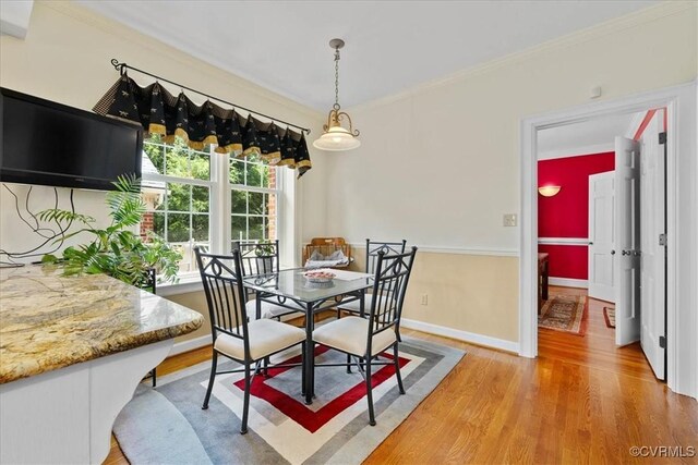 104 Peter Francisco Dr, Hopewell, VA 23860 - dining area with light wood-style floors, ornamental molding, and baseboards