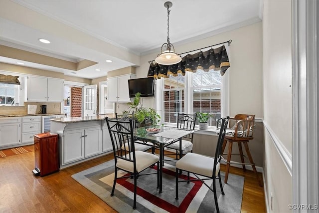 104 Peter Francisco Dr, Hopewell, VA 23860 - dining area with ornamental molding, wood finished floors, and beverage cooler