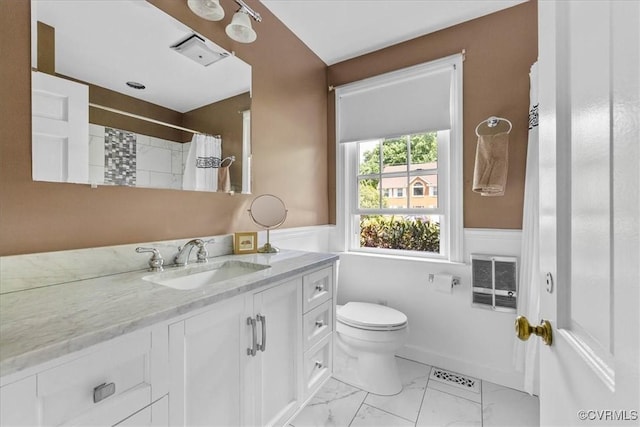 104 Peter Francisco Dr, Hopewell, VA 23860 - bathroom with vanity, toilet, marble finish floors, a wainscoted wall, and a shower with shower curtain