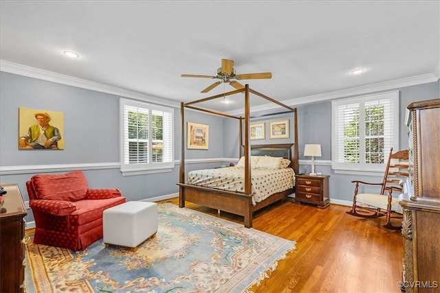 104 Peter Francisco Dr, Hopewell, VA 23860 - bedroom featuring ornamental molding, multiple windows, wood finished floors, baseboards, and recessed lighting
