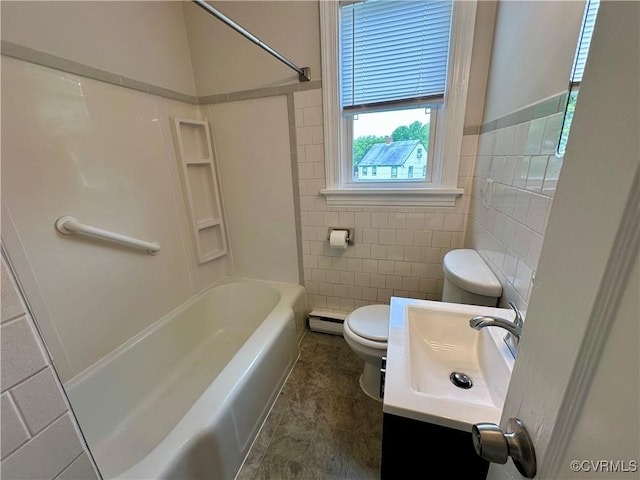2404 Parrish St, Henrico, VA 23231 - bathroom with tile walls, toilet, vanity, shower / washtub combination, and tile patterned flooring