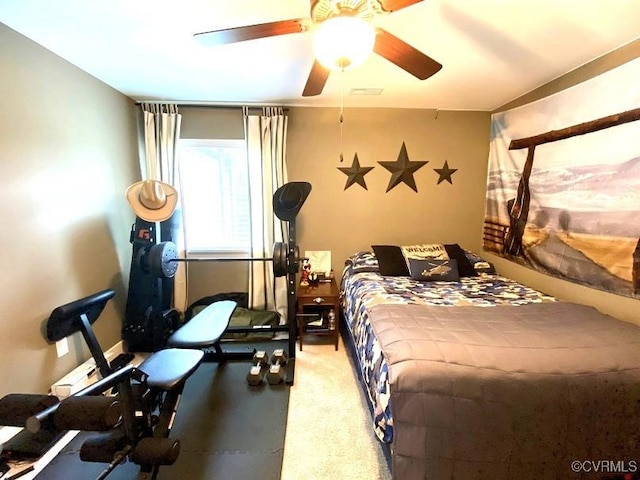 bedroom with carpet flooring and a ceiling fan