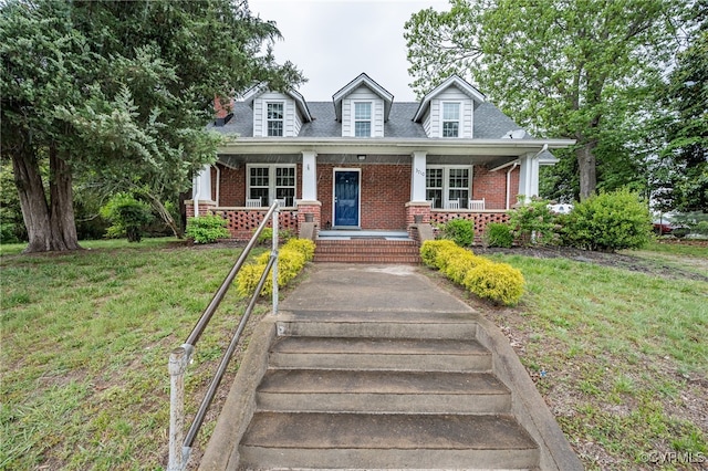 3710 W Hundred Rd, Chester, VA 23831 - cape cod-style house with brick siding, a porch, a front yard, and roof with shingles