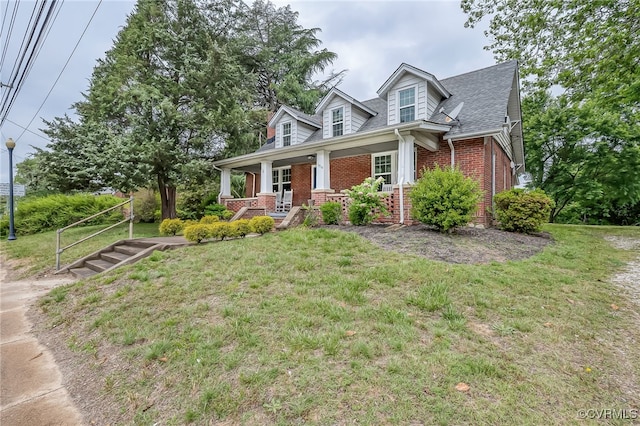 3710 W Hundred Rd, Chester, VA 23831 - cape cod home featuring brick siding, a porch, a front lawn, and a shingled roof