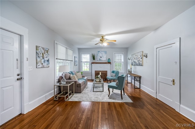 3710 W Hundred Rd, Chester, VA 23831 - living area with hardwood / wood-style floors, baseboards, a ceiling fan, and a brick fireplace
