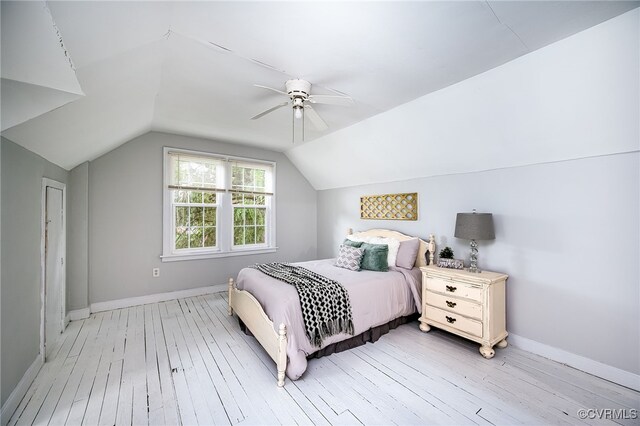 3710 W Hundred Rd, Chester, VA 23831 - bedroom with light wood finished floors, vaulted ceiling, a ceiling fan, and baseboards