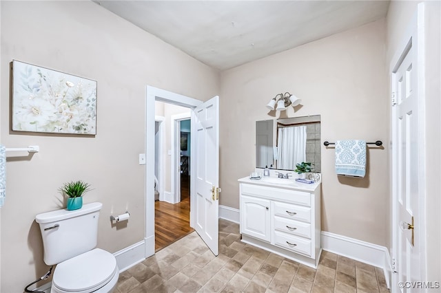 3710 W Hundred Rd, Chester, VA 23831 - bathroom with baseboards, toilet, and vanity