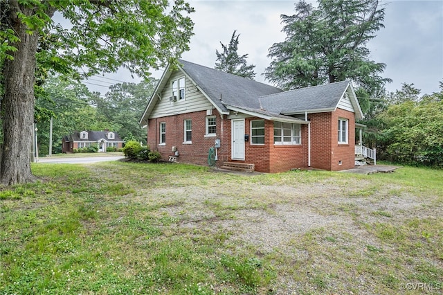 3710 W Hundred Rd, Chester, VA 23831 - view of front facade with brick siding, a front yard, roof with shingles, and entry steps