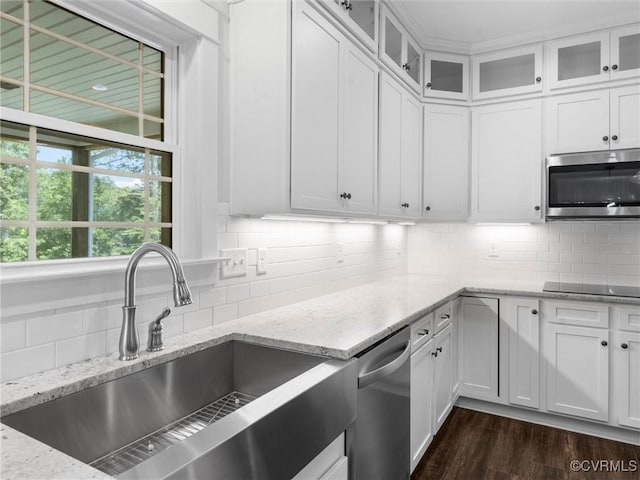 1280 Mill Quarter Rd, Powhatan, VA 23139 - kitchen with appliances with stainless steel finishes, tasteful backsplash, and white cabinetry