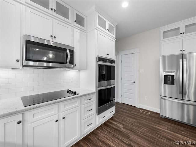1280 Mill Quarter Rd, Powhatan, VA 23139 - kitchen featuring stainless steel appliances, dark wood-style floors, backsplash, light stone countertops, and recessed lighting