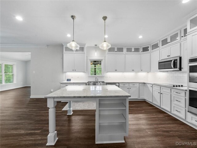 1280 Mill Quarter Rd, Powhatan, VA 23139 - kitchen with stainless steel appliances, healthy amount of natural light, backsplash, recessed lighting, and ornamental molding