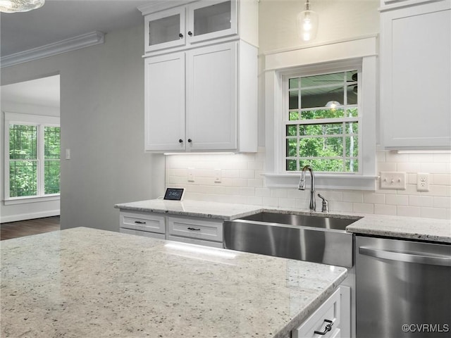 1280 Mill Quarter Rd, Powhatan, VA 23139 - kitchen with stainless steel dishwasher, glass insert cabinets, light stone counters, ornamental molding, and white cabinetry