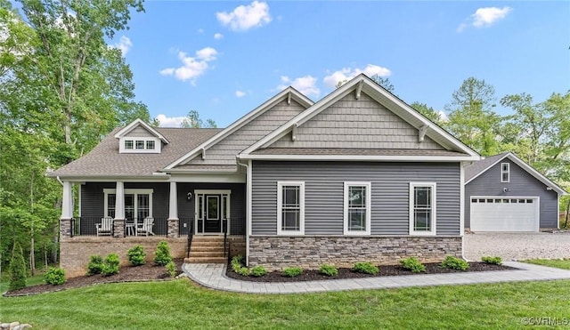 1280 Mill Quarter Rd, Powhatan, VA 23139 - craftsman inspired home with covered porch, a front lawn, stone siding, gravel driveway, and roof with shingles
