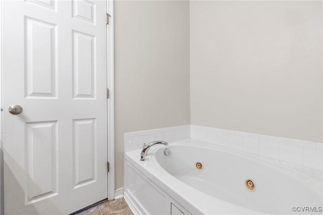 2409 Silver Lake Ter, Midlothian, VA 23112 - bathroom with a tub with jets