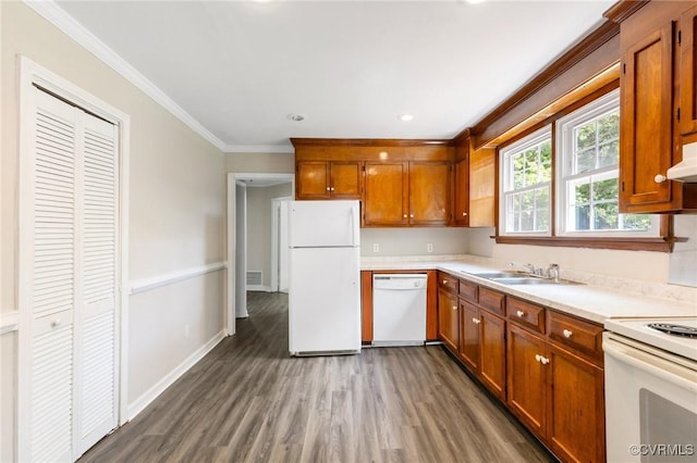3507 Howard Rd, Henrico, VA 23223 - kitchen with white appliances, a sink, dark wood-style flooring, brown cabinets, and crown molding