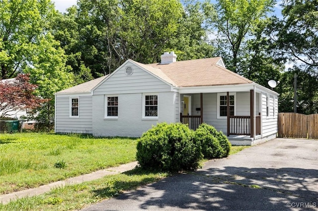 3507 Howard Rd, Henrico, VA 23223 - view of front facade featuring a chimney and covered porch
