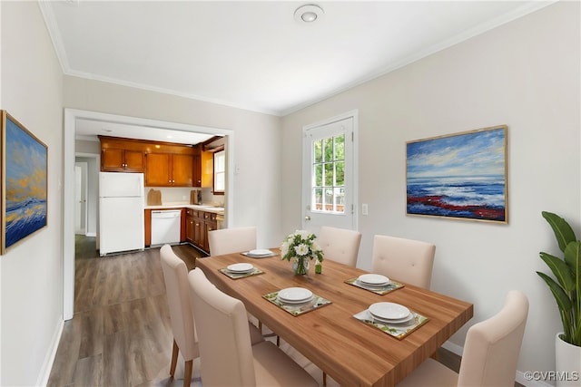 3507 Howard Rd, Henrico, VA 23223 - dining room featuring dark wood-style flooring, ornamental molding, and baseboards